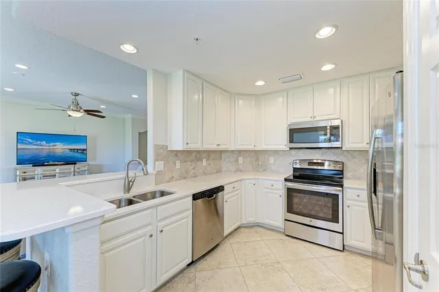 a view of a swimming pool with an outdoor space and seating area