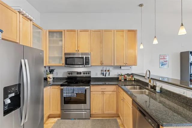 a kitchen with a sink and a window