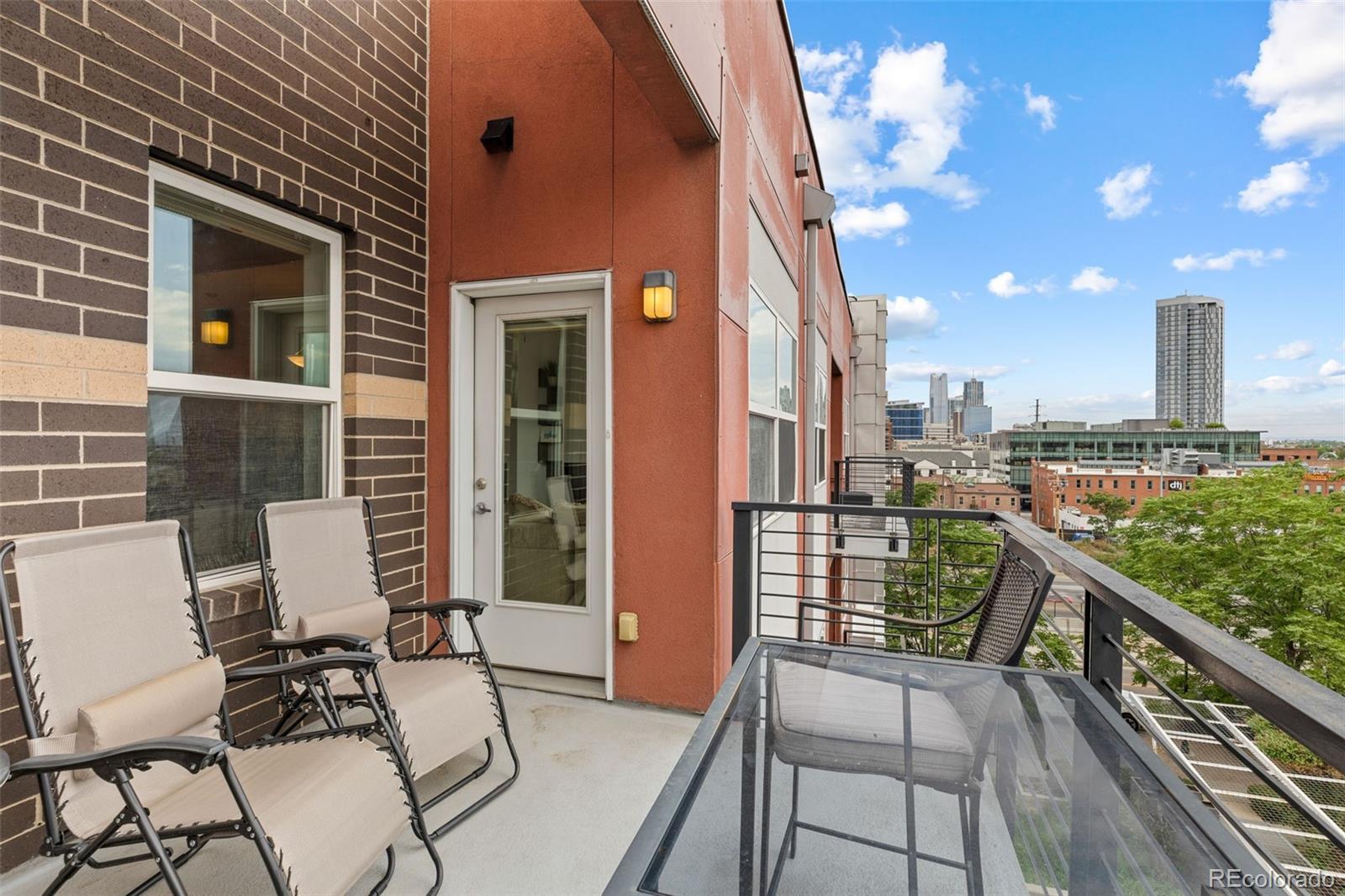 1555 Central Street, Unit 306 Denver, CO 80211 - Photo 22 of 36 a view of balcony with furniture
