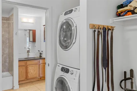 a view of closet area with rug