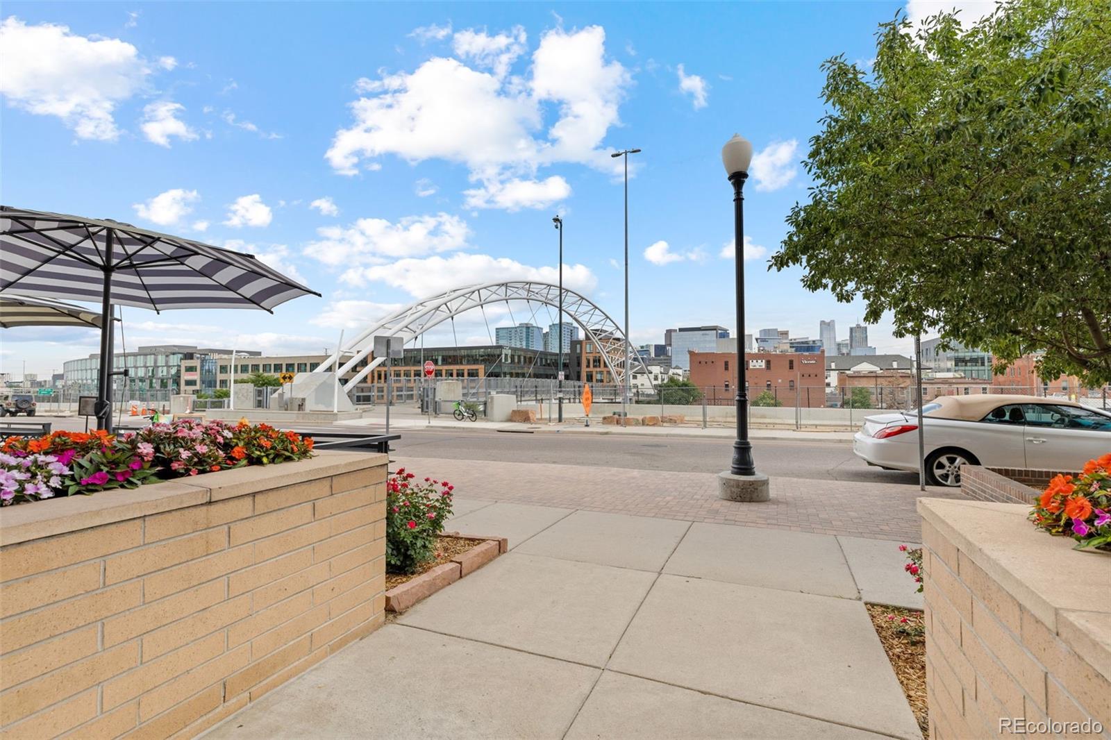 1555 Central Street, Unit 306 Denver, CO 80211 - Photo 5 of 36 a view of store room with washer and dryer