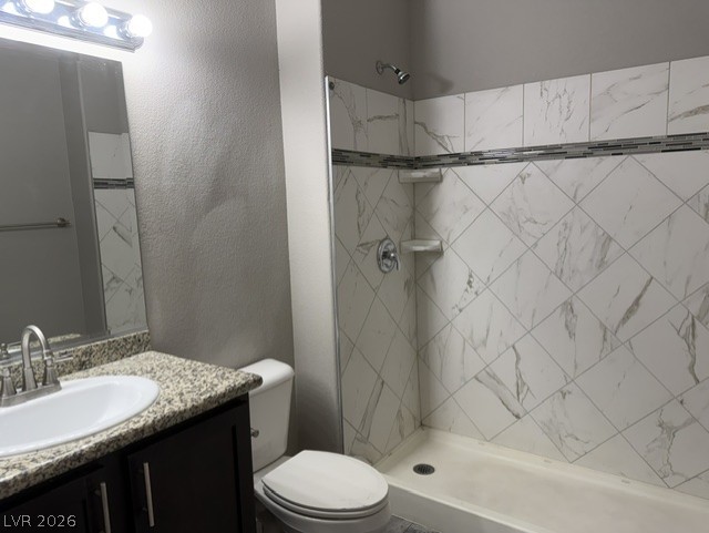 3318 North Decatur Boulevard, Unit 1163 Las Vegas, NV 89130 - Photo 25 of 35 A well-appointed bathroom with a spacious vanity and a neatly tiled walk-in shower.