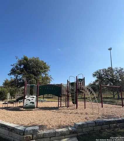 a view of a terrace with trees