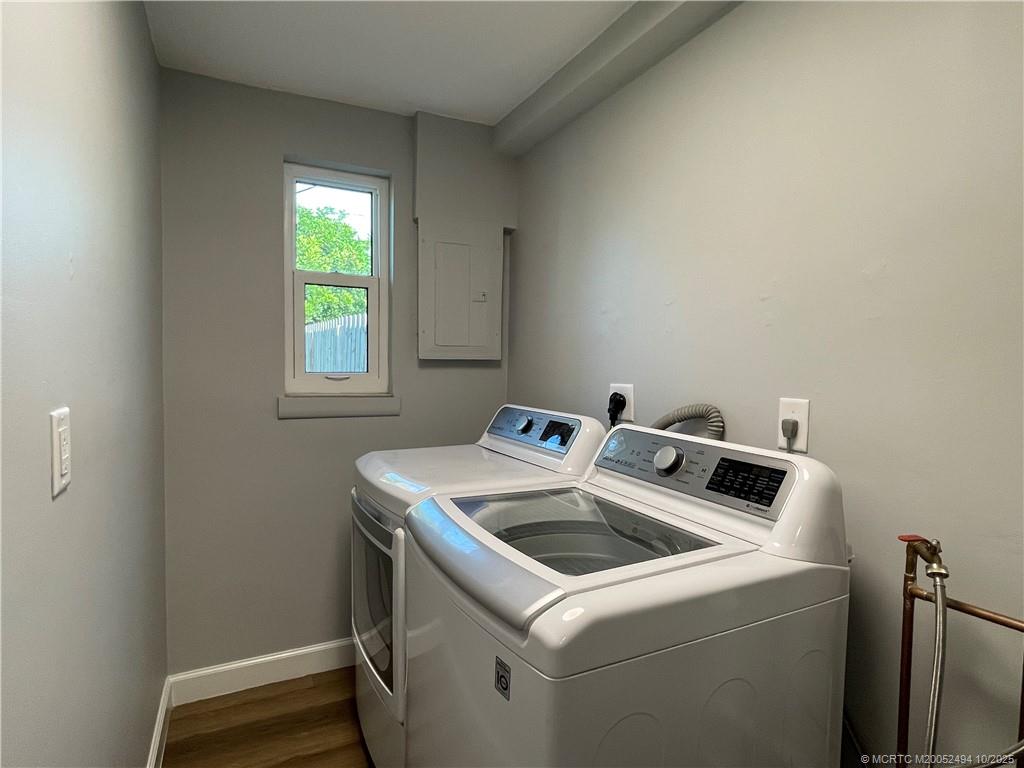 406 Robalo Court Stuart, FL 34996 - Photo 13 of 22 a utility room with dryer and washer