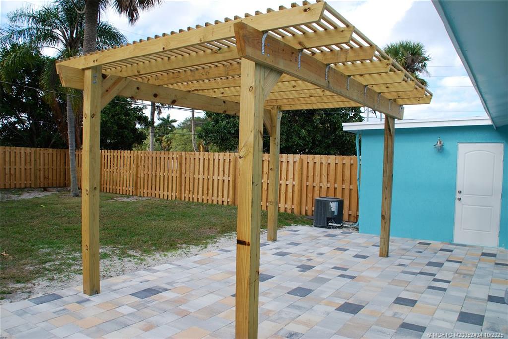 406 Robalo Court Stuart, FL 34996 - Photo 16 of 22 a view of a porch