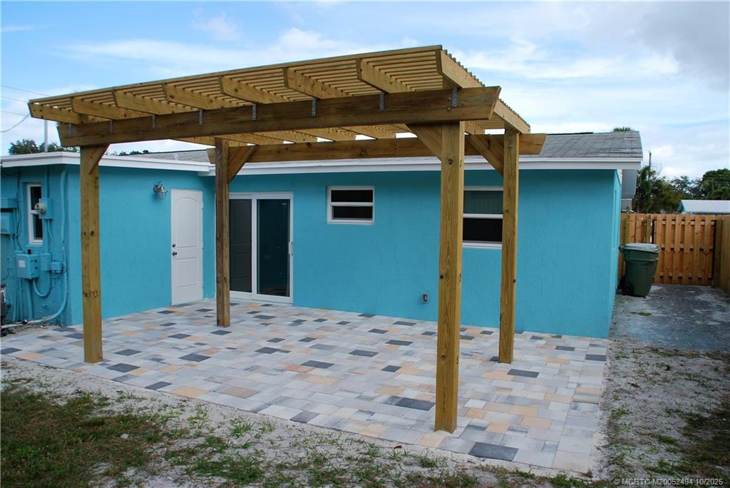 406 Robalo Court Stuart, FL 34996 - Photo 18 of 22 a front view of a house