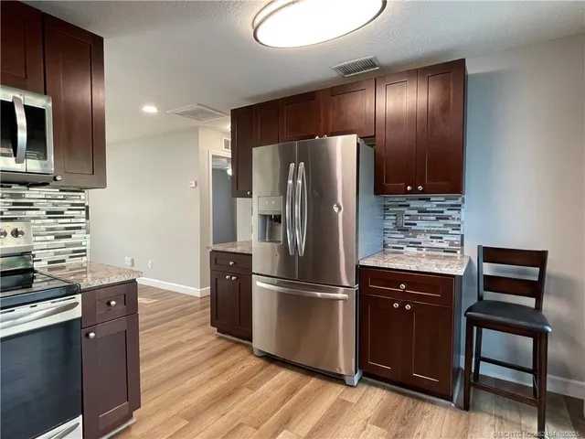 an empty room with a workspace