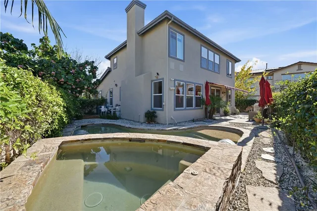 a view of a house with swimming pool