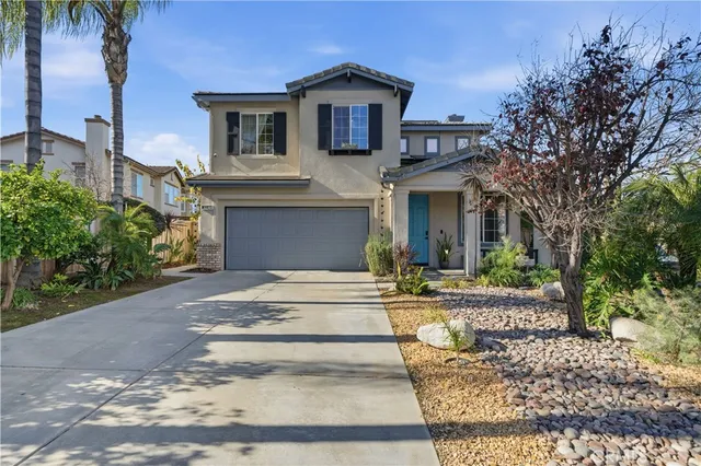 a house view with a garden space