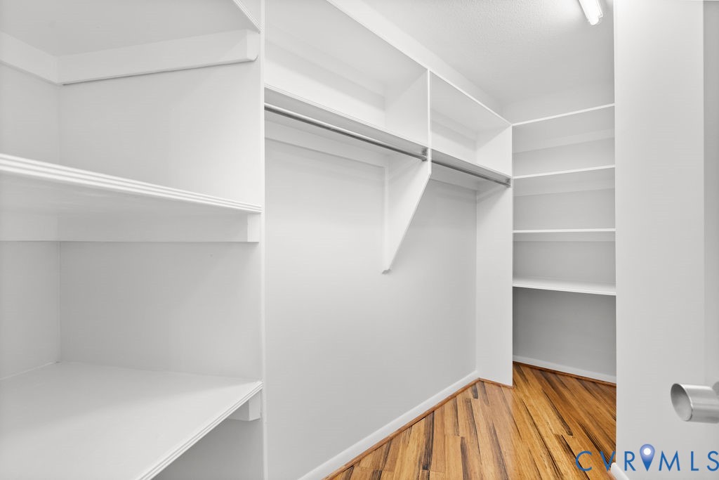 2956 Hathaway Road, Unit U704 Richmond, VA 23225 - Photo 30 of 42 Walk-in closet featuring built-in white shelving,
