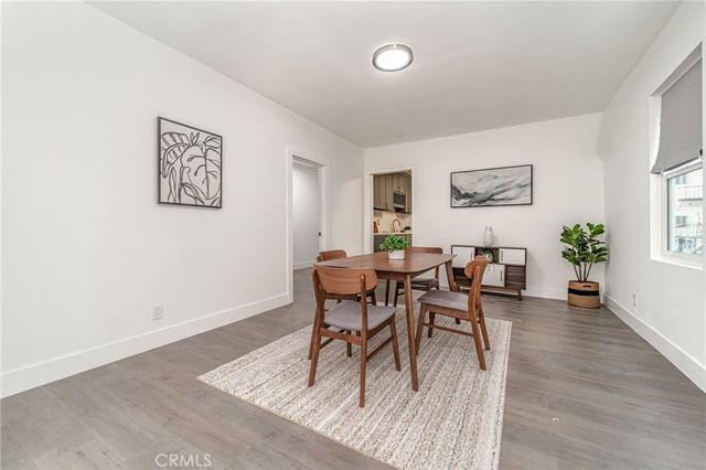 a bathroom with a toilet sink and shower