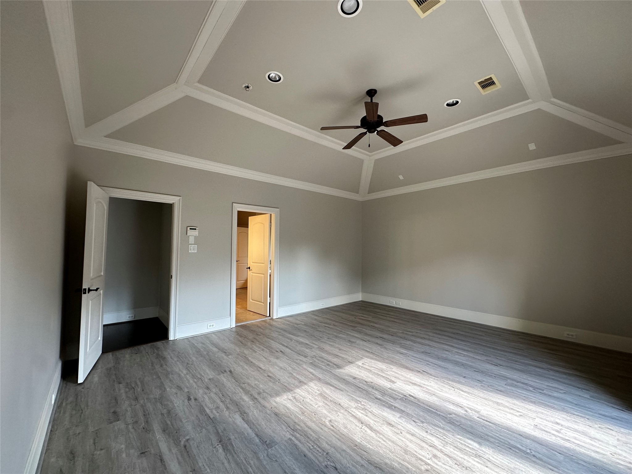 7619 Pine Ridge Terrace Road Houston, TX 77081 - Photo 21 of 32 wooden floor in an empty room