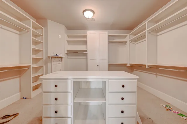 a utility room with cabinets