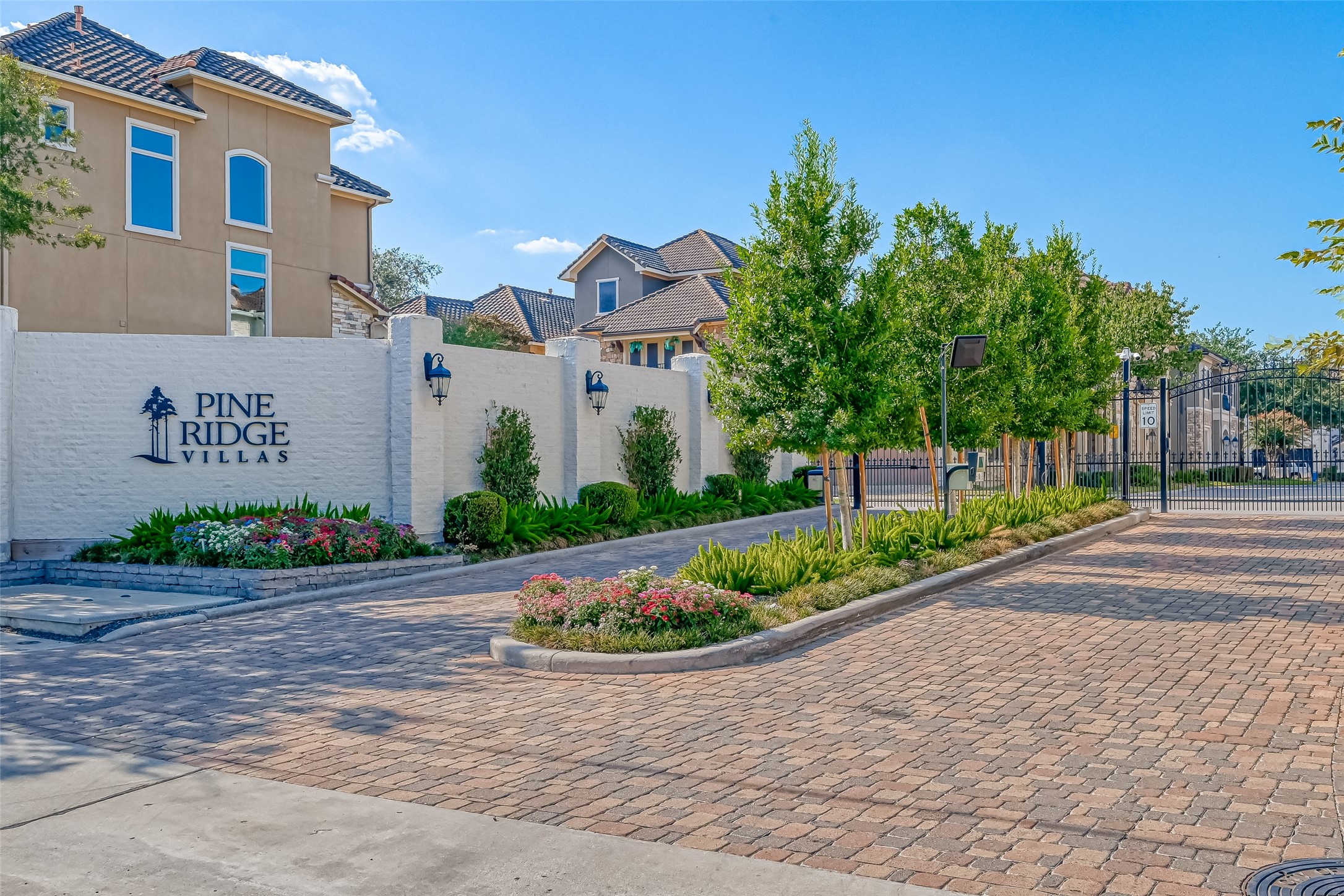 7619 Pine Ridge Terrace Road Houston, TX 77081 - Photo 32 of 32 a front view of a house with garden