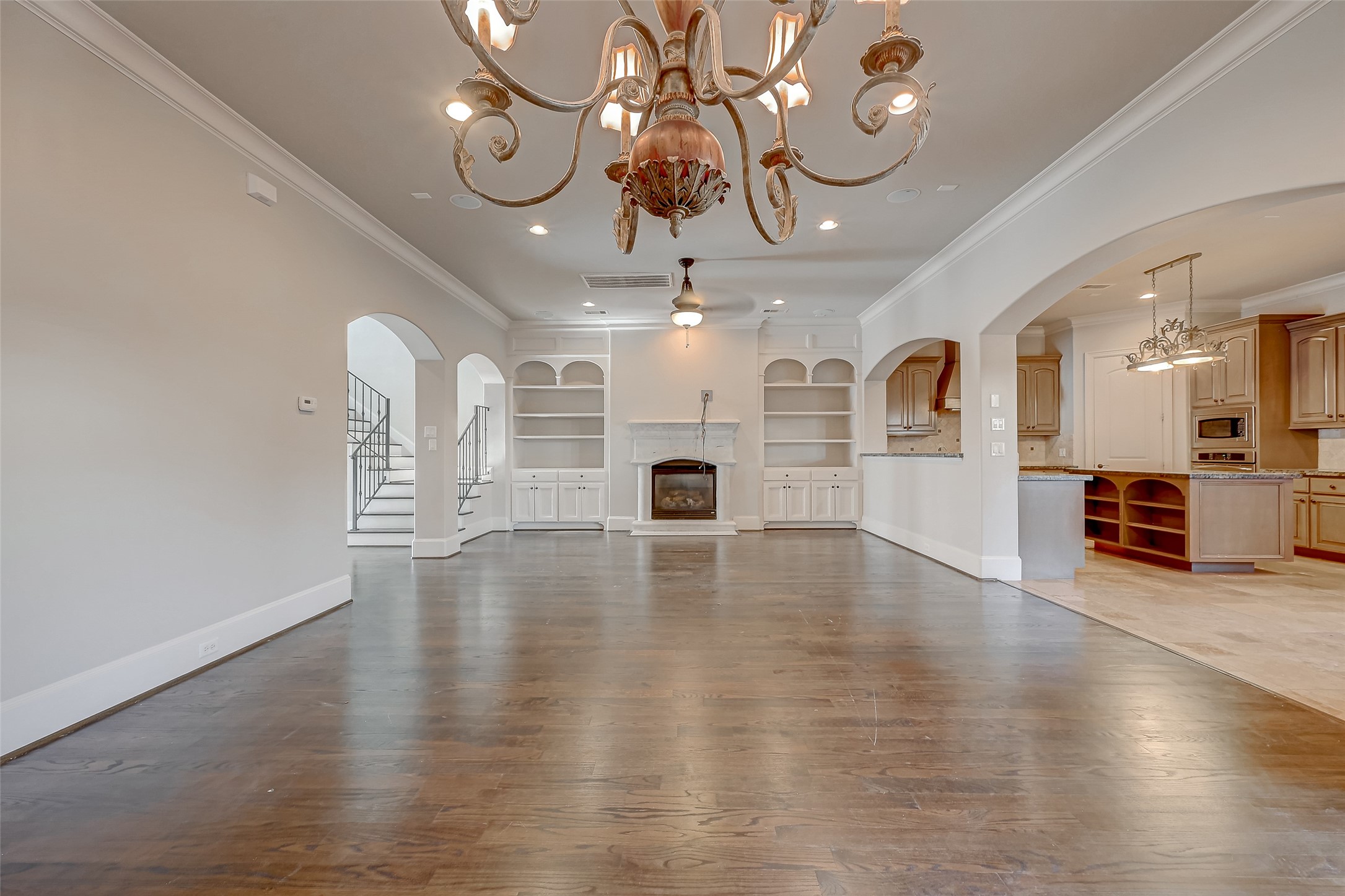 7619 Pine Ridge Terrace Road Houston, TX 77081 - Photo 8 of 32 a view of a room with wooden floor