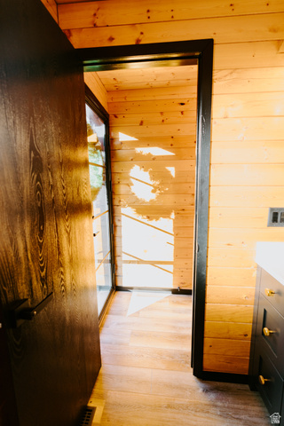 1413 Basel Drive Midway, UT 84049 - Photo 46 of 137 Corridor featuring wooden walls and light wood-style floors