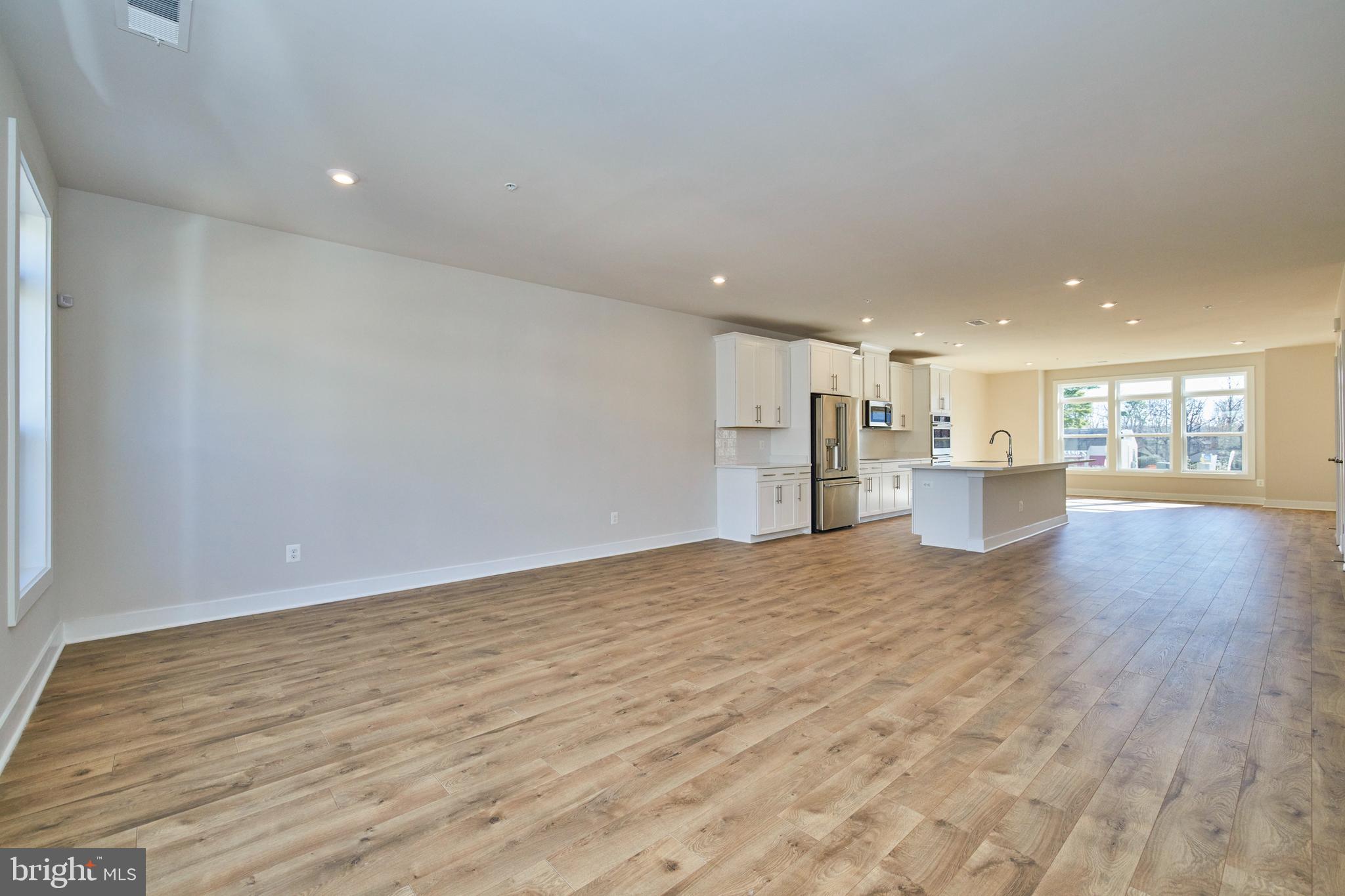 1682 Bandit Loop, Unit 14B Reston, VA 20190 - Photo 16 of 44 Kitchen and LR