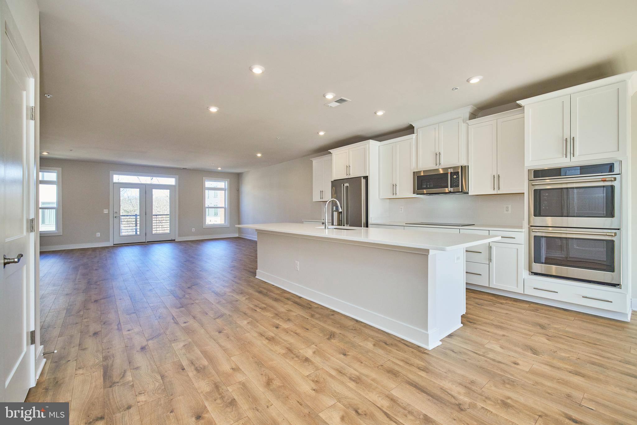 1682 Bandit Loop, Unit 14B Reston, VA 20190 - Photo 17 of 44 Kitchen and LR