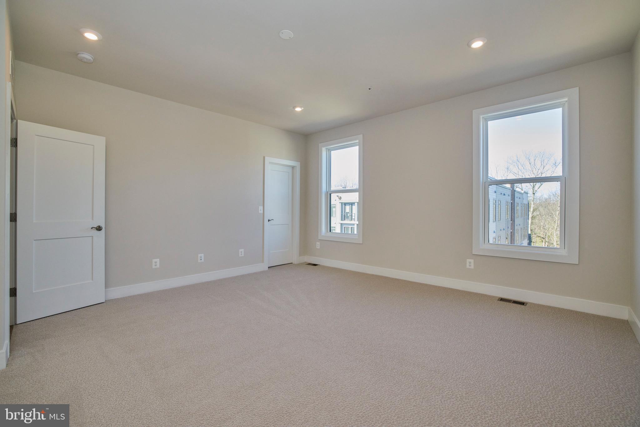 1682 Bandit Loop, Unit 14B Reston, VA 20190 - Photo 26 of 44 Primary Bedroom