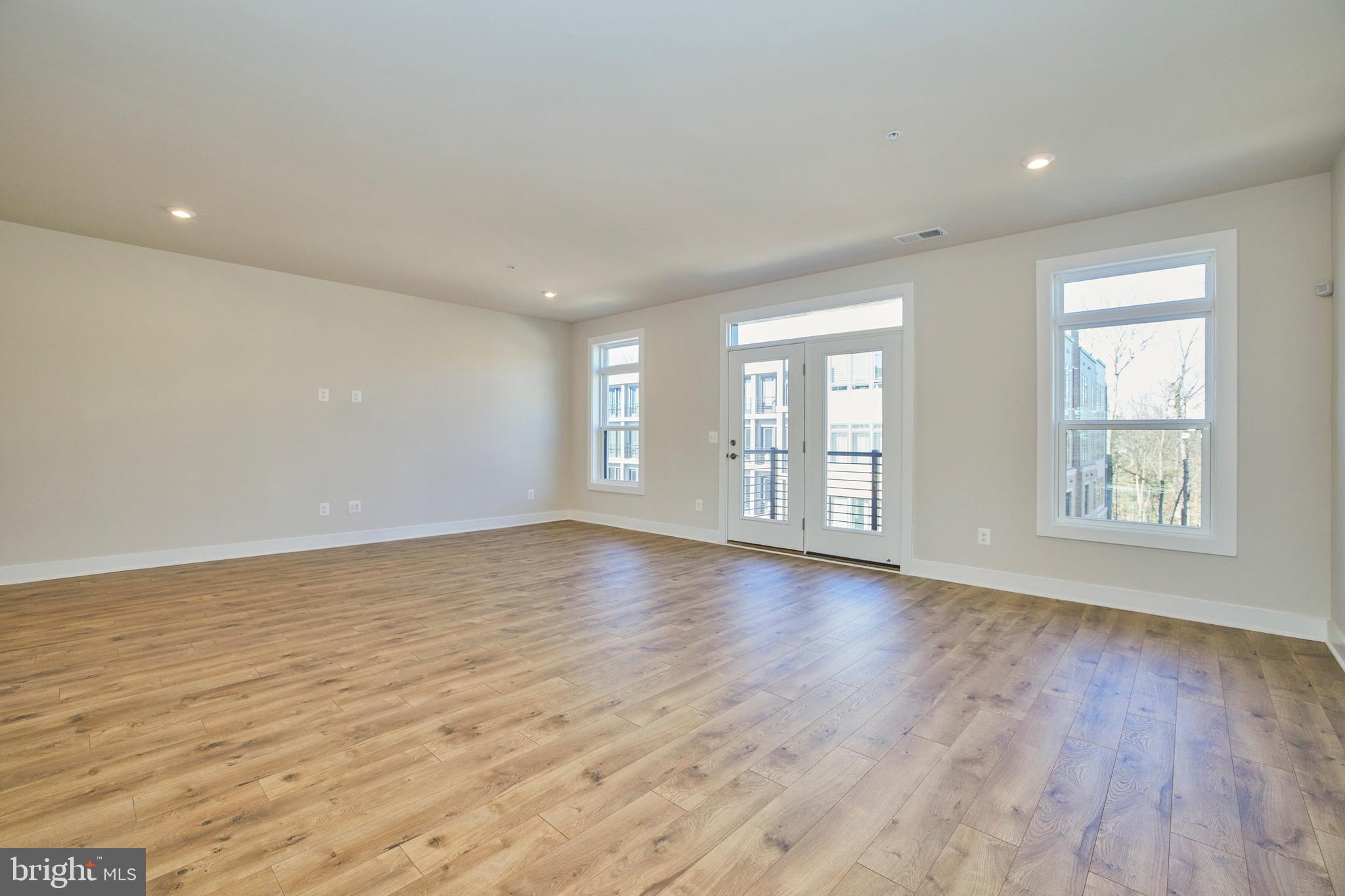 1682 Bandit Loop, Unit 14B Reston, VA 20190 - Photo 7 of 44 Living Room