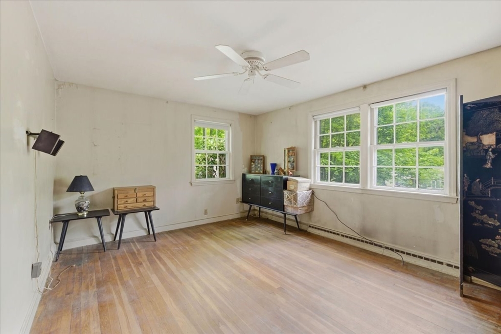 99 Brook Road Sharon, MA 02067 - Photo 25 of 37 a workspace with furniture hardwood and a window