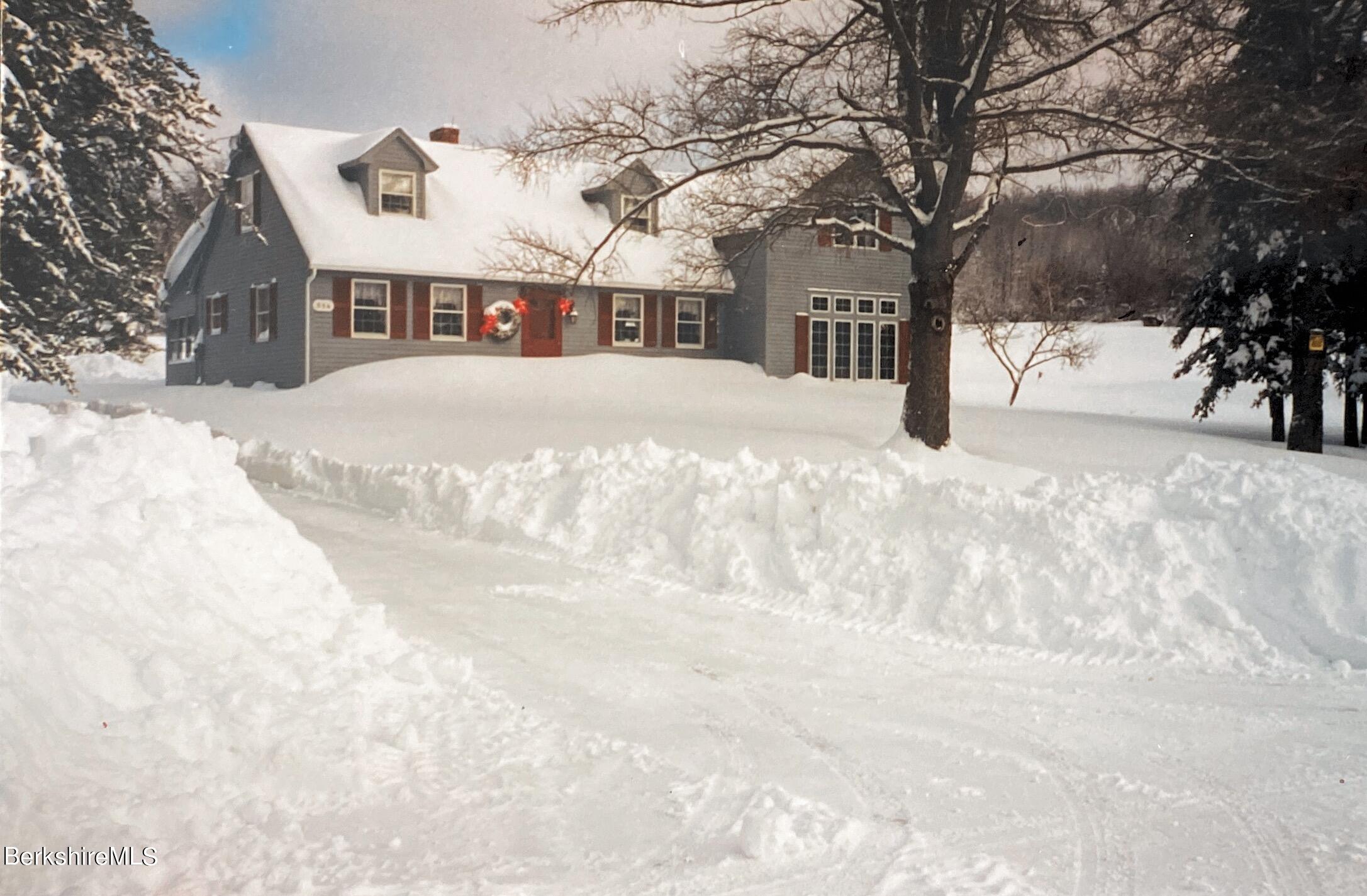 884 Cheshire Road Windsor, MA 01270 - Photo 3 of 4 a view of street with snow on the road