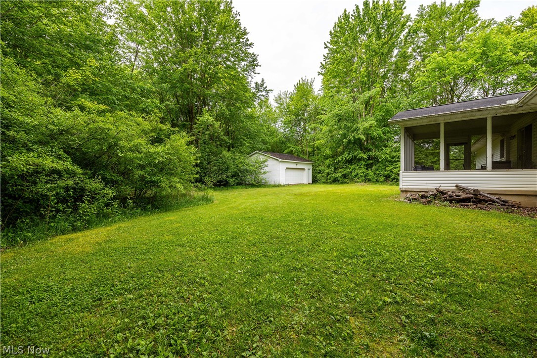 6211 Russia Road Amherst, OH 44001 - Photo 34 of 50 View of yard with an outdoor structure