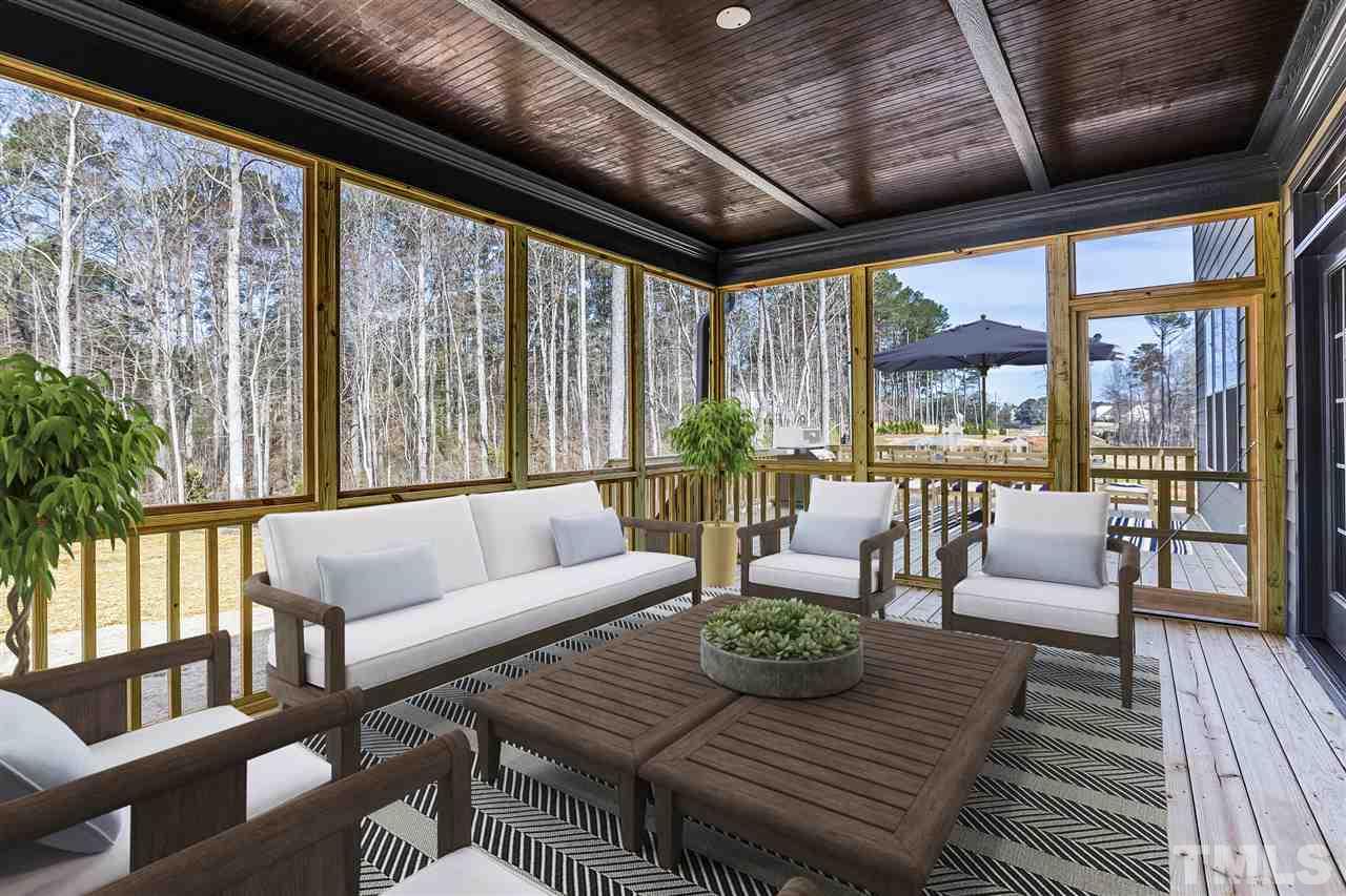 1416 Baileys Run Court Raleigh, NC 27606 - Photo 4 of 21 Oversized and an extension of your living space. Treeline view and huge yard to make an outside patio or firepit area.