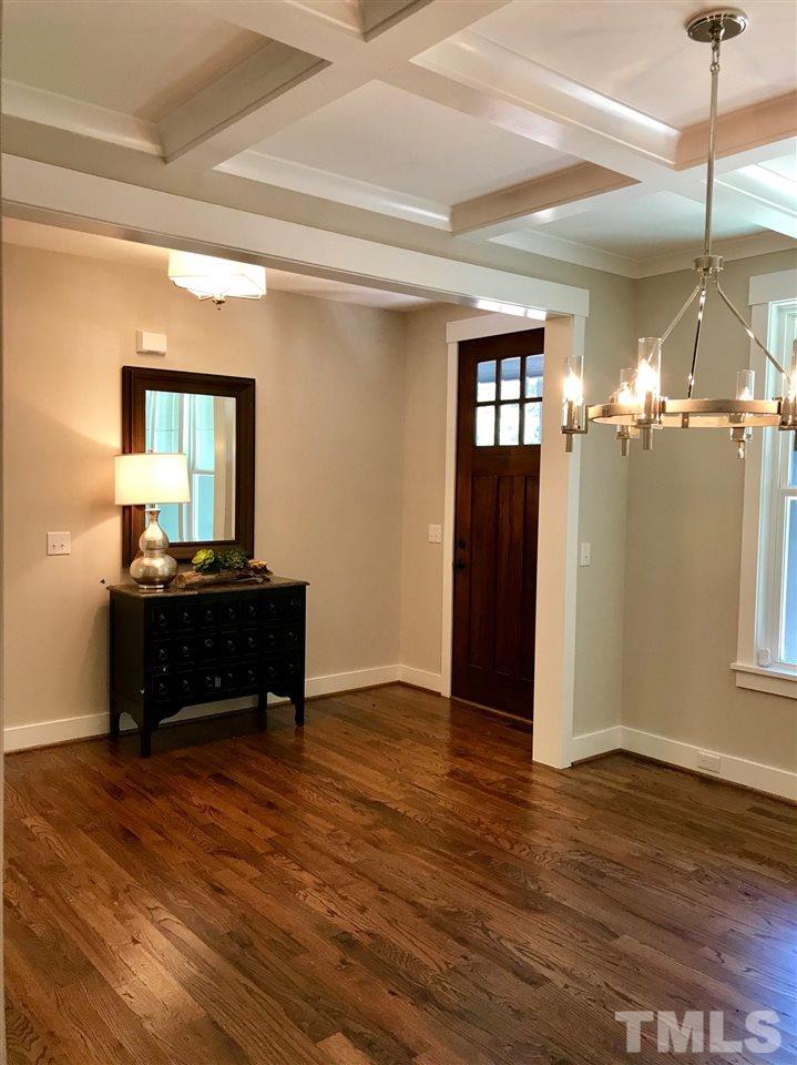 1416 Baileys Run Court Raleigh, NC 27606 - Photo 5 of 21 Formal foyer entry adorned by dining room coiffered ceiling.