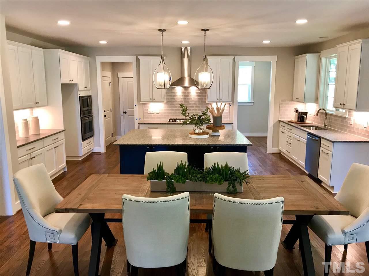 1416 Baileys Run Court Raleigh, NC 27606 - Photo 7 of 21 Tons of extra cabinet and counter space. Gas cooktop and stainless appliance. Fridge included with preferred lender.