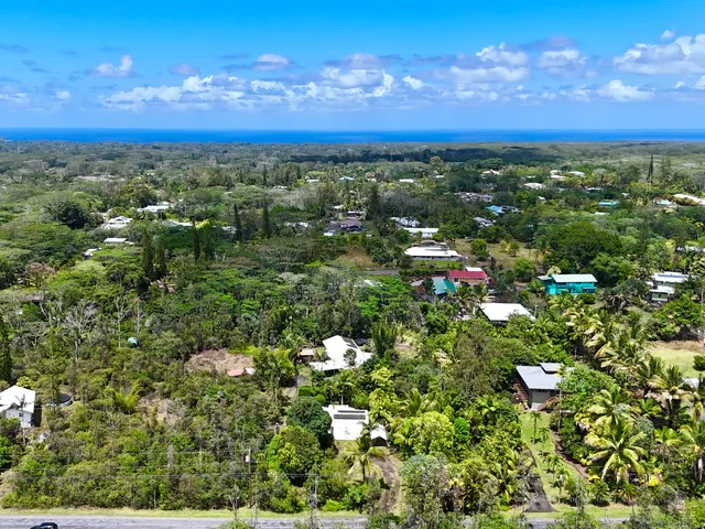 a picture of a room with a white wall and a picture