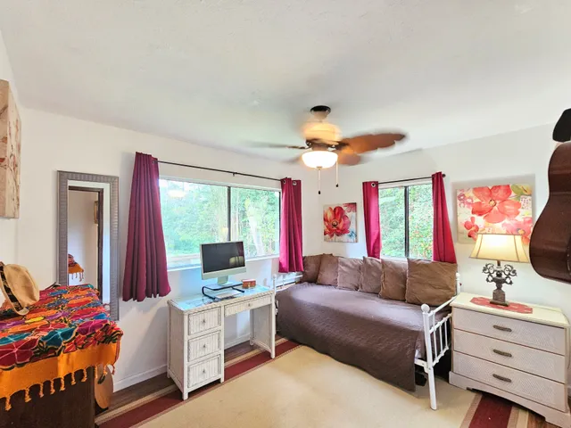 a kitchen with stainless steel appliances granite countertop a stove a refrigerator and a sink