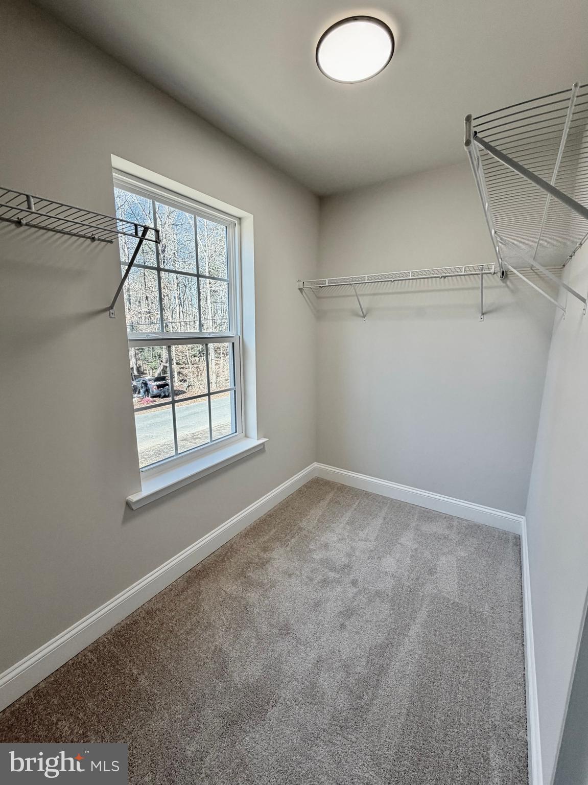 613 Santa Fe Trail Lusby, MD 20657 - Photo 20 of 24 a view of a livingroom with a dishwasher and a window