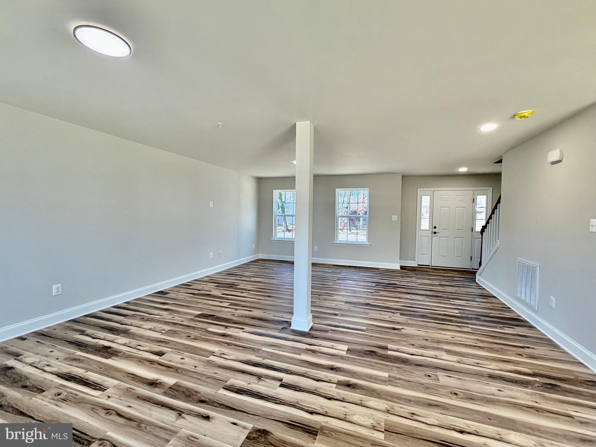 613 Santa Fe Trail Lusby, MD 20657 - Photo 3 of 24 a view of a room with wooden floor and window