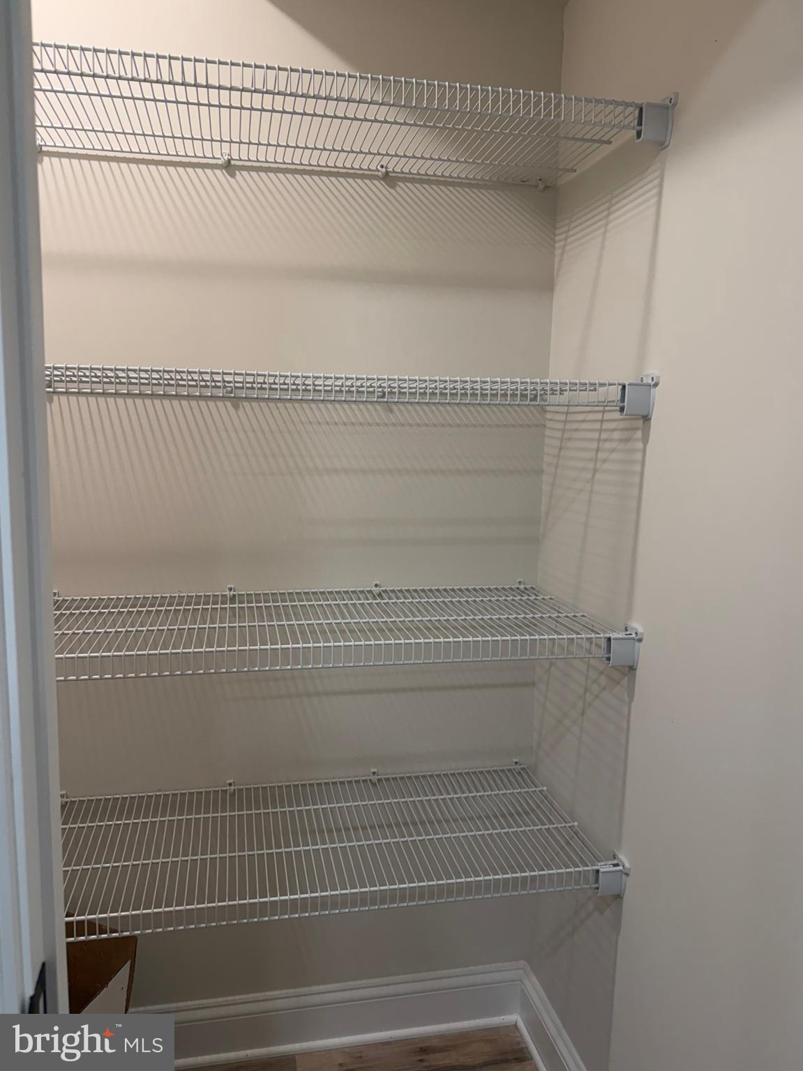 613 Santa Fe Trail Lusby, MD 20657 - Photo 7 of 24 a view of a door with wooden floor