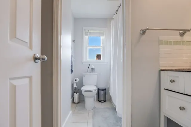 a bathroom with a toilet and a sink