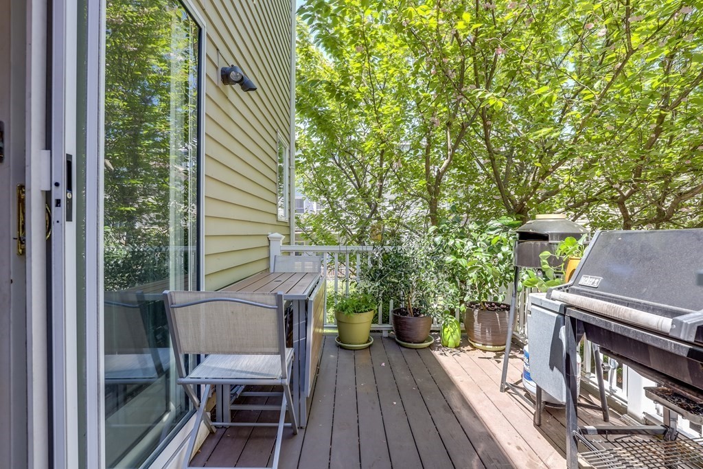 154 West 3rd Street, Unit 154 Boston, MA 02127 - Photo 24 of 26 a view of balcony with two chairs and a table