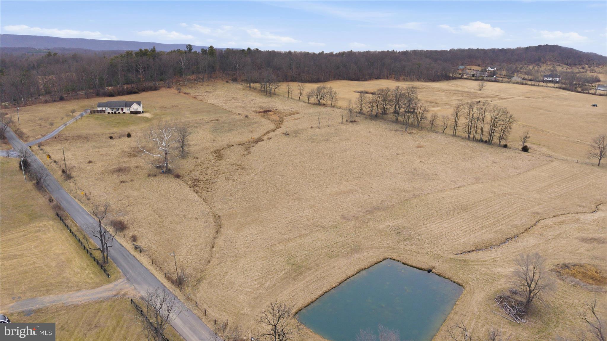 Tbd Gough Road Winchester, VA 22602 - Photo 12 of 20 a view of a lake with mountain in the background