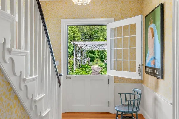 a view of a window and chair in a room
