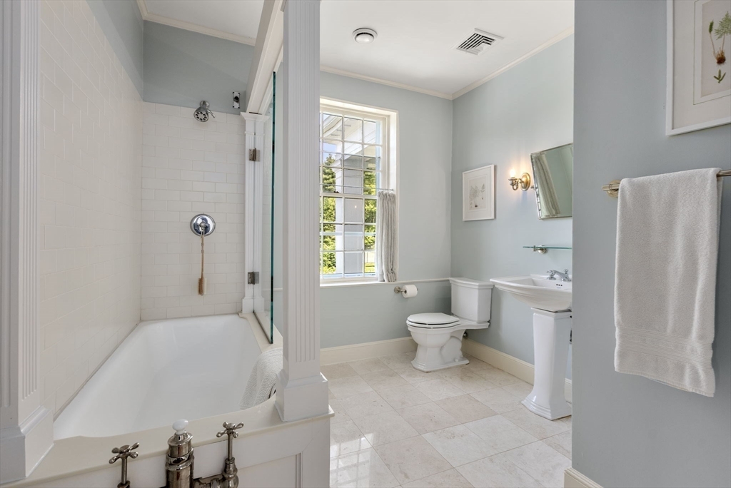 427 Concord Road Sudbury, MA 01776 - Photo 30 of 42 a bathroom with a sink toilet and shower