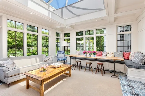 a room with furniture and a large window