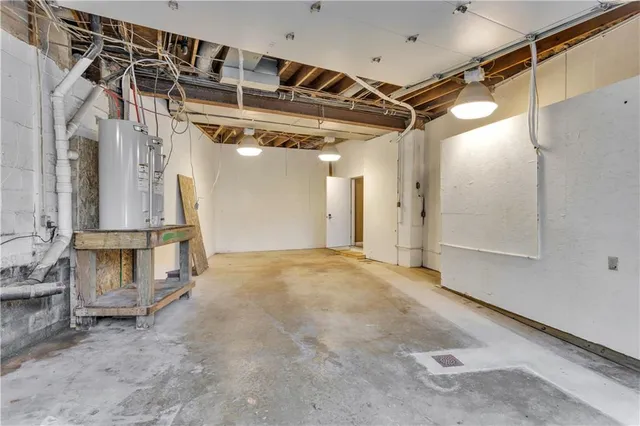 a view of a room with wooden walls