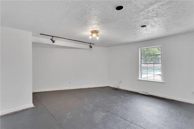 a view of a room that has a window in it