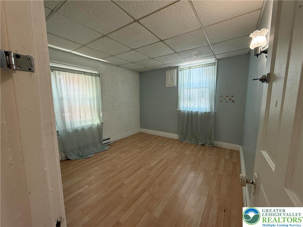 445 Washington Street Allentown, PA 18102 - Photo 23 of 27 a view of an empty room with a window