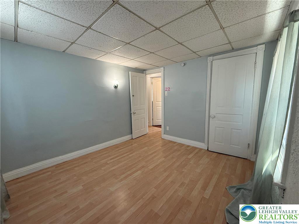 445 Washington Street Allentown, PA 18102 - Photo 24 of 27 a view of an empty room with wooden floor