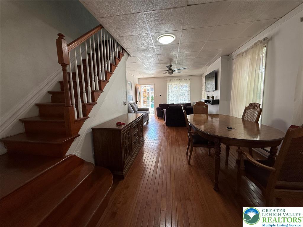 445 Washington Street Allentown, PA 18102 - Photo 4 of 27 a view of a dining room with furniture window and wooden floor