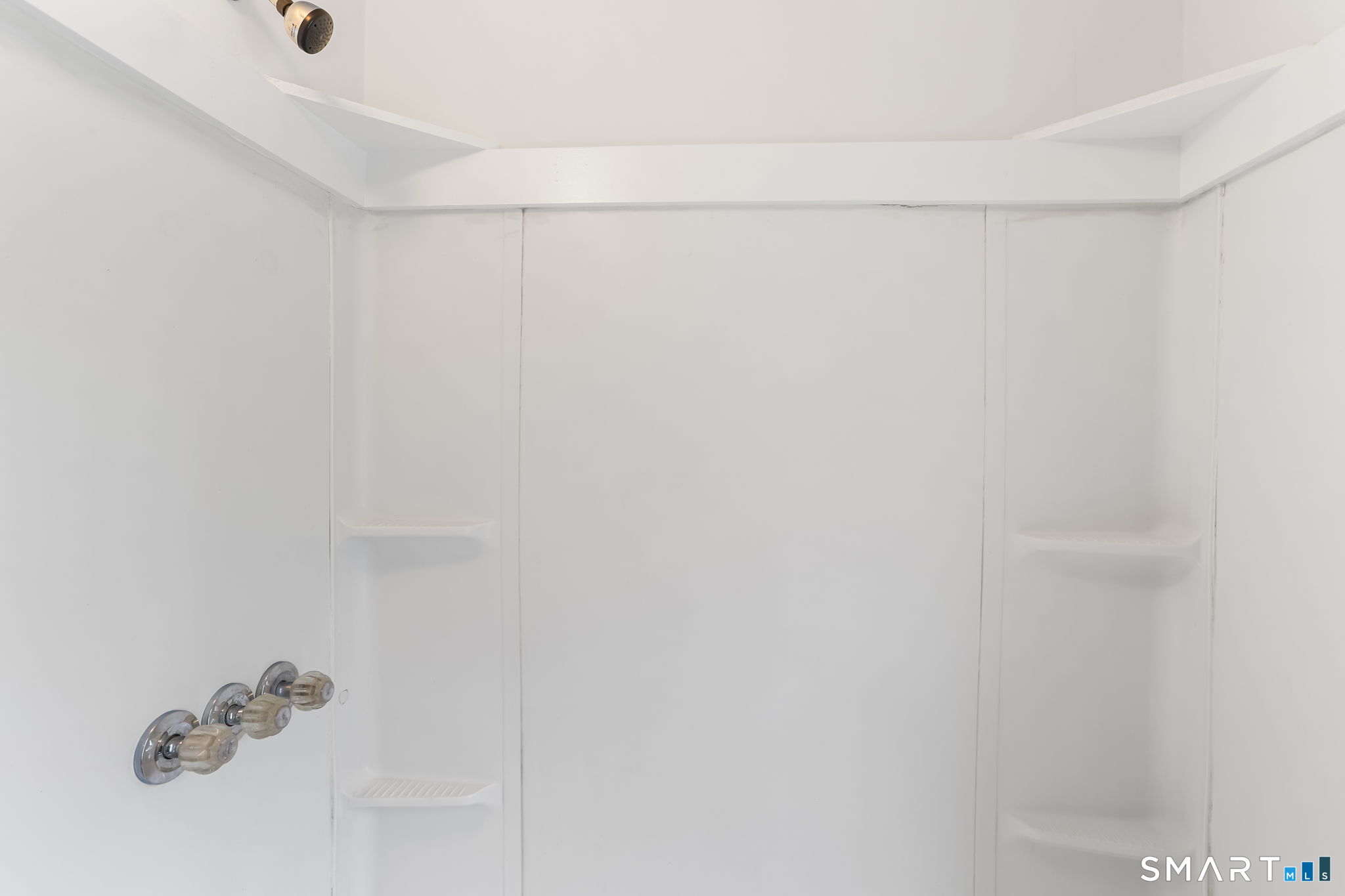 63 Reynolds Street, Unit B Killingly, CT 06239 - Photo 13 of 32 a bathroom with a shower