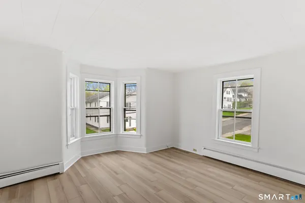 a view of an empty room and window