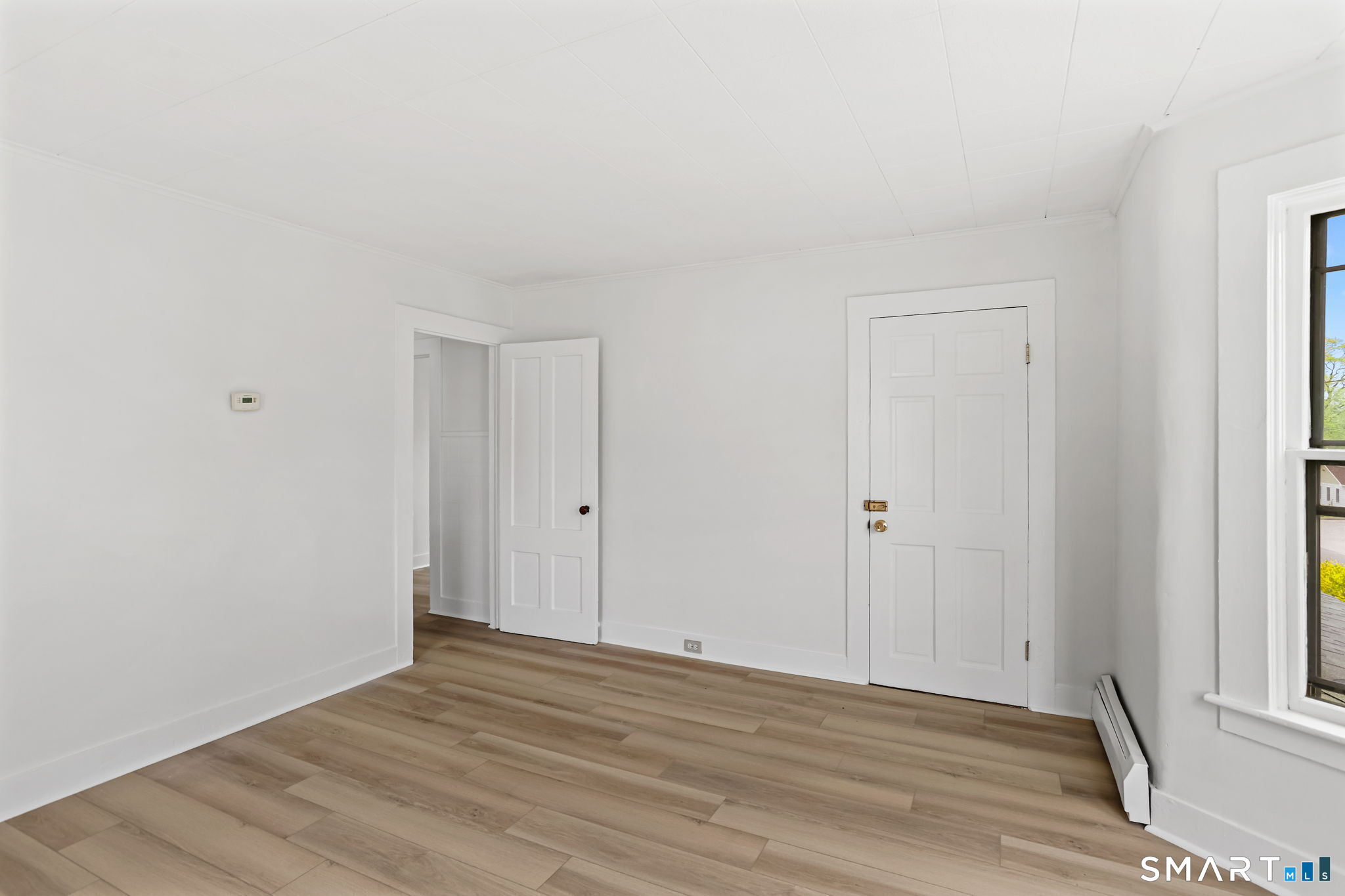 63 Reynolds Street, Unit B Killingly, CT 06239 - Photo 31 of 32 a view of an empty room and window