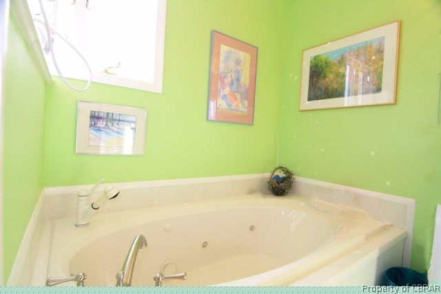 271 Burnt Wharf Road Lancaster, VA 22503 - Photo 4 of 35 a bathroom with a tub